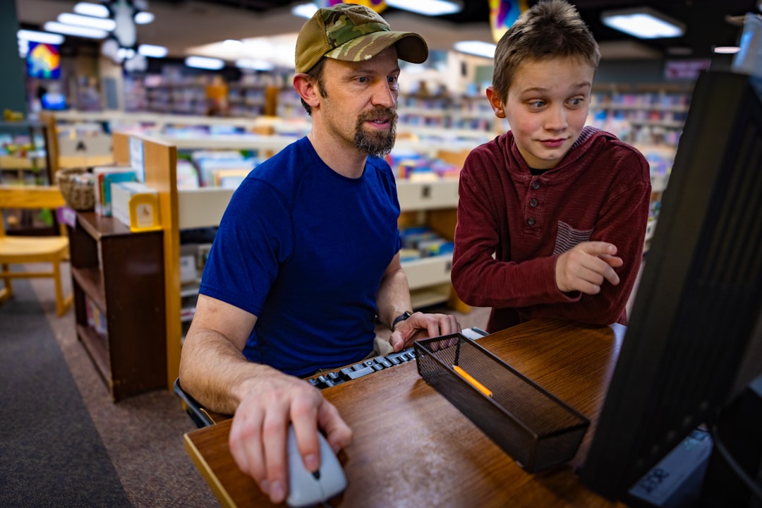 Technician walking a customer through a computer buying decision