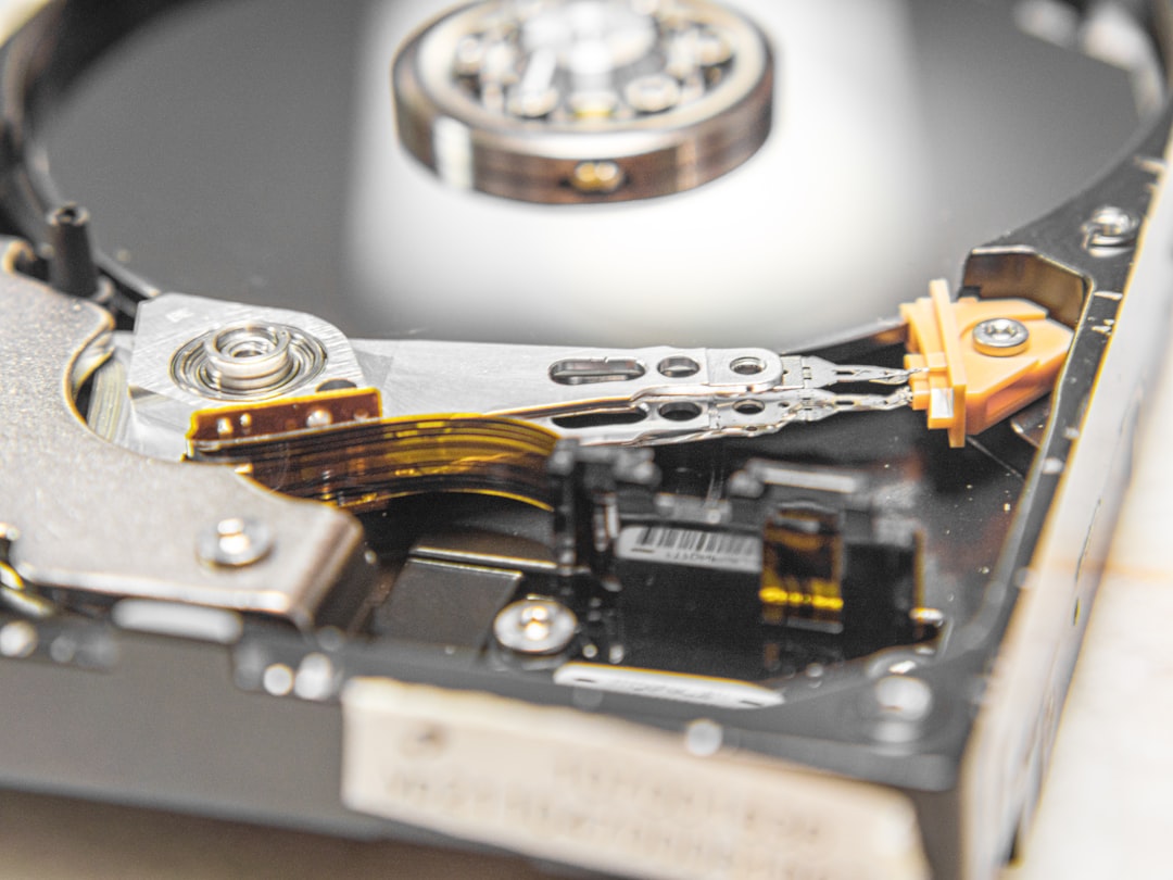 Close-up of a hard disk drive during a data recovery job